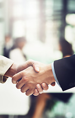 Image showing Partnership, welcome and team shaking hands in office after corporate meeting or interview. Collaboration, deal and closeup of business people with handshake for greeting or introduction in workplace