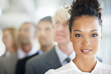 Image showing Business woman, face and portrait of leader in management, leadership or diversity at the office. Corporate female person or boss in diverse group, team with unity for company growth at workplace