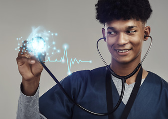 Image showing Happy man, doctor and stethoscope for futuristic healthcare, cardiology or heart rate. Male medical professional with smile checking cardiovascular, rhythm or sound against a grey studio background