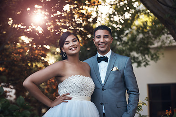 Image showing Portrait, happy and couple for wedding and celebration in the garden to celebrate their commitment. Marriage, man and woman in outdoor together with happiness for celebration with love and smiling.