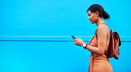 Image showing Space, phone and mockup with woman by wall for communication, social media and internet. Technology, connection and vacation with female mobile user in city for online, networking and travel app