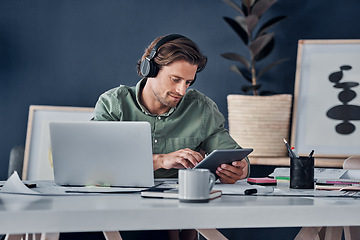 Image showing Music headphones, tablet and business man in office streaming radio podcast. Technology, professional and male person listening to audio, sound or song, online browsing or social media, email and app