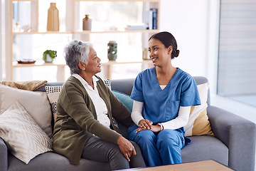 Image showing Healthcare, retirement and a nurse talking to an old woman on a sofa in the living room of a nursing home. Medical, trust and care with a female medicine professional chatting to a senior resident