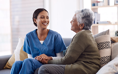 Image showing Retirement, sofa and caregiver with senior woman for conversation, chatting and support in living room. Healthcare, nursing home and female nurse with elderly patient for wellness, comfort and help