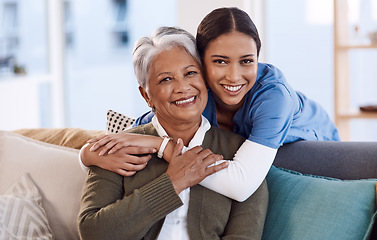 Image showing Portrait, smile and nurse hug old woman in retirement house, bonding and medical care. Face, hugging and elderly person with caregiver in nursing home on living room sofa for health, support or help.