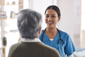 Image showing Healthcare, smile and a nurse talking to an old woman about treatment in a nursing home facility. Medical, happy and a female medicine professional chatting to a senior resident during a visit