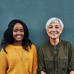 Image showing Together, diversity and portrait of women on a blue background for success, happiness and work. Smile, business and a young and senior employee standing on a wall for a professional career profile