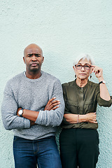 Image showing Business, people and arms crossed in portrait with blue background with vision about teamwork experience. Professional, together and focus outdoor on wall for collaboration and working management