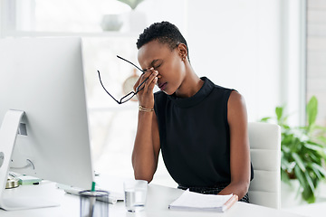 Image showing Stress, headache and black woman on computer in office with anxiety, pain and audit crisis. Burnout, vertigo and African person frustrated or tired with business fail, eye strain or bad fatigue