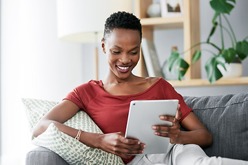 Image showing Digital tablet, relax and happy black woman on a sofa for social media, reading and browsing blog in her home. Smile, online and African female person on couch with ebook, streaming or subscription