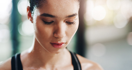 Image showing Fitness, workout and female athlete sweating in the gym after sports and strength training. Motivation, goals and woman doing a wellness and health exercise with focus in a sport center or studio.