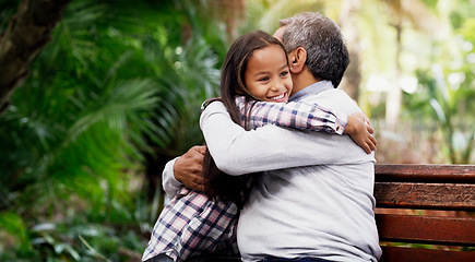 Image showing Hug, girl and grandfather in a park, love and happiness on a break, loving and bonding together. Happy, granddad or female grandchild embrace, outdoor and cheerful with a smile and relax in a garden