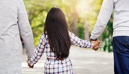 Image showing Back, park and a girl holding hands with her grandparents while walking together in a garden during summer. Nature, family or kids and a female child, grandmother and grandfather bonding outdoor