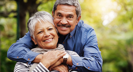 Image showing Portrait, hug and senior couple with love, outdoor and relationship with happiness, romance and retirement. Face, happy partners and mature woman with elderly man, marriage and embrace in a park