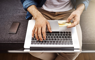 Image showing Top view, hands and laptop with credit card, man and typing for online shopping, cybersecurity and payment. Man, computer and fintech on internet for discount, sale or deal with password for banking