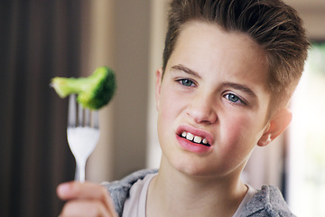 Image showing Disgust, food and fear with child and broccoli for nutrition, health and cooking. Sad, angry and dinner with boy and refuse to eat vegetable at home for eating problem, frustrated and dislike