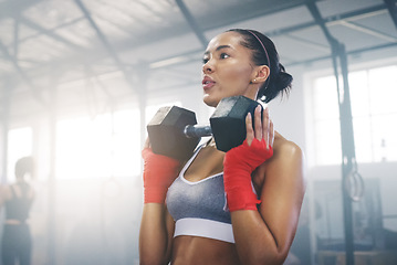 Image showing Focus, sweating and dumbbell with woman in gym for training, weightlifting and workout. Health, strong and sports with female bodybuilder in fitness center for exercise, motivation and wellness