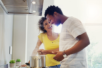 Image showing Cooking, love and happy with couple in kitchen for bonding, breakfast and morning. Happiness, smile and food with man and woman preparing meal together at home for relax, nutrition and wellness