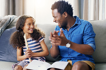 Image showing Learning, music and flute with father and daughter for bonding, education and helping. Love, happy and smile with man and young girl in family home for child development, recorder and instrument