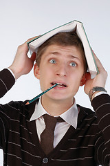 Image showing Young man tired of studying