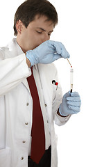 Image showing Crime Scene investigator testing a swab for blood