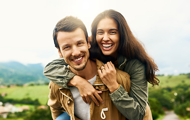 Image showing Happy, love and piggyback with portrait of couple in nature for happy, smile and bonding. Happiness, relax and care with face of man carrying woman on countryside date for spring, vacation in Brazil
