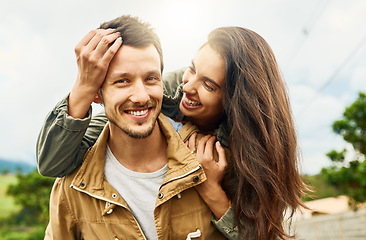 Image showing Smile, love and piggyback with couple in nature for happy, weekend and bonding. Happiness, relax and care with portrait of man carrying woman on countryside date for spring, vacation and support