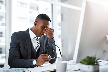 Image showing Black man in business, headache and stress with burnout, depression and brain fog in office. Male person with pain at desk, migraine and tired, overworked with work crisis anxiety in the workplace