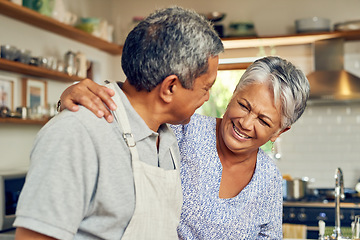 Image showing Cooking, hug and old couple in kitchen with smile, healthy marriage bonding in home and helping with dinner. Happiness, help and love, senior man and woman with happy face, meal prep and retirement.