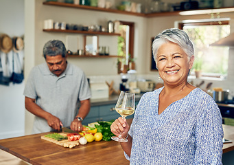 Image showing Portrait of old woman in kitchen with man, wine and cooking healthy food together in home. Bonding, smile and senior couple in house with meal prep, happiness and drinks to relax in retirement time.