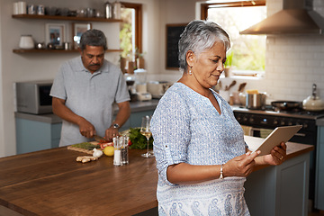 Image showing Marriage, cooking and old couple in kitchen with tablet, healthy food and lunch time in home. Digital recipe, senior woman reading online and man making salad, nutrition and health in retirement diet