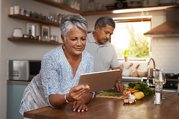 Image showing Internet, old woman at kitchen counter with man and tablet, cooking healthy food together in home. Digital recipe, health and senior couple with meal prep, happiness and wellness diet in retirement.