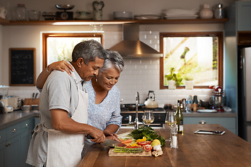 Image showing Cooking, old man and woman with vegetables at kitchen counter, healthy food and marriage bonding in home. Salad, help and dinner, senior couple with happiness, vegetable meal prep and retirement diet