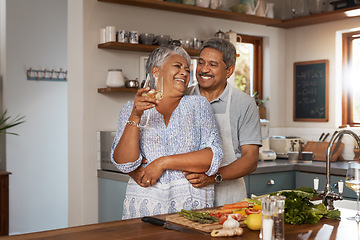 Image showing Happiness, hug and old couple at kitchen counter with wine, food and cooking healthy dinner together. Smile, embrace and love, senior man and happy woman in retirement with drinks, vegetables and fun