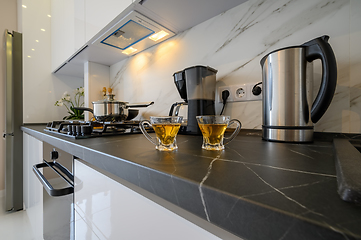 Image showing Closeup to modern kitchen cupboard