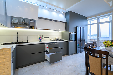 Image showing Luxury white and dark grey modern kitchen interior