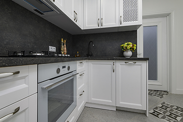 Image showing Luxury well designed modern black and white kitchen