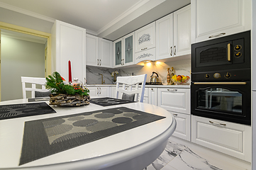 Image showing White kitchen in classic style just before the Christmas