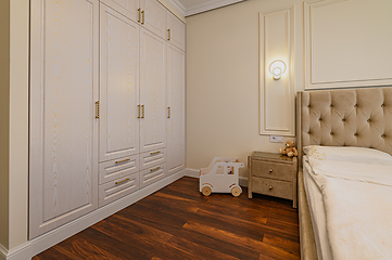 Image showing Beige colored modern bedroom interior with double bed