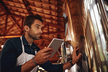 Image showing Tablet, beer and quality control with man in factory for production, manufacturing and alcohol fermentation. Technology, inspection and digital with business owner for distillery, storage and brewery