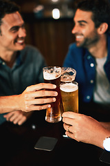 Image showing Beer, cheers and man hands drinking with friends at social event in a restaurant with happiness. Alcohol, glasses and toast at a pub at happy hour with smile and talk with drinks and celebration