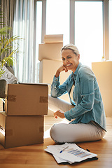 Image showing Woman, boxes and portrait with document on the floor with a smile at a new home for investment. Property, box and paperwork with happiness for investing in real estate for finance and retirement.