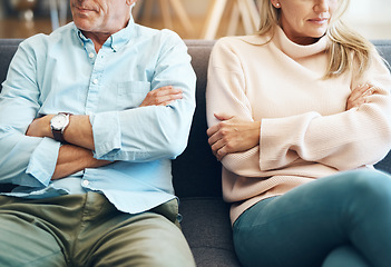 Image showing Divorce, fail and couple fight due to marriage problem, angry at home about family law and with conflict in a lounge. Anger, sad and people or partner frustrated due to infertility on a sofa