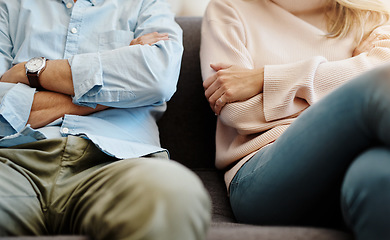 Image showing Divorce, sad and couple fight due on a couch due to marriage problem or conflict in a lounge sofa. Anger, fail and angry people or partner frustrated in a living room due to cheating or argument