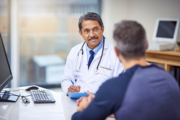 Image showing Healthcare, consultation and male doctor talking to a patient about a diagnosis in the clinic. Professional, discussion and mature medical worker in discussion with a man in the medicare hospital.