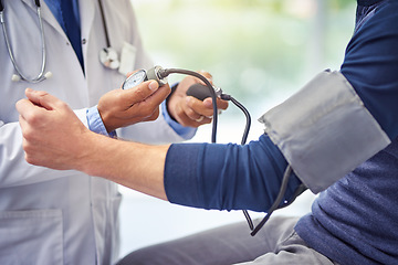 Image showing Check up, doctor and man patient for blood pressure test at a hospital with lens flare. Consultant or medical workers, health wellness and nurse with male person for healthcare exam at a clinic