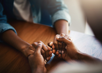 Image showing Empathy, prayer and support with friends and holding hands for comfort, kindness and gratitude. Hope, help and trust with closeup of people at home for depression, praying and forgiveness