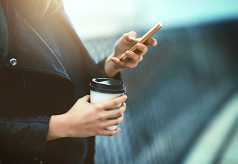 Image showing Coffee, hands and phone for social media in city, internet scroll and web browsing mockup. Cellphone, hand and woman networking, texting online and messaging, website and mobile app outdoor on street