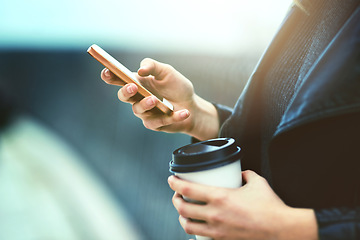 Image showing Coffee, hands and cellphone for texting in city, internet scroll and web browsing mockup. Phone, hand and woman networking, online social media and messaging, website and mobile app outdoor on street