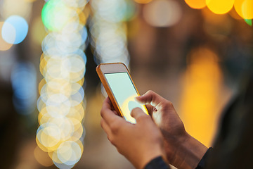 Image showing Bokeh, hands and cellphone for typing in city, internet scroll and web browsing at night mockup space. Phone, hand closeup and woman networking, online social media and mobile app for email outdoor.